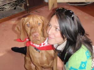 Rachael with Oscar, Vizsla, as a adolescent dog